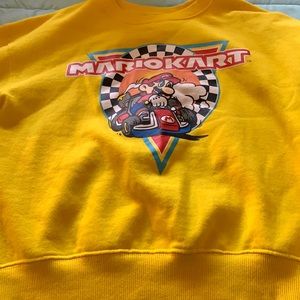 Yellow Mario kart sweater